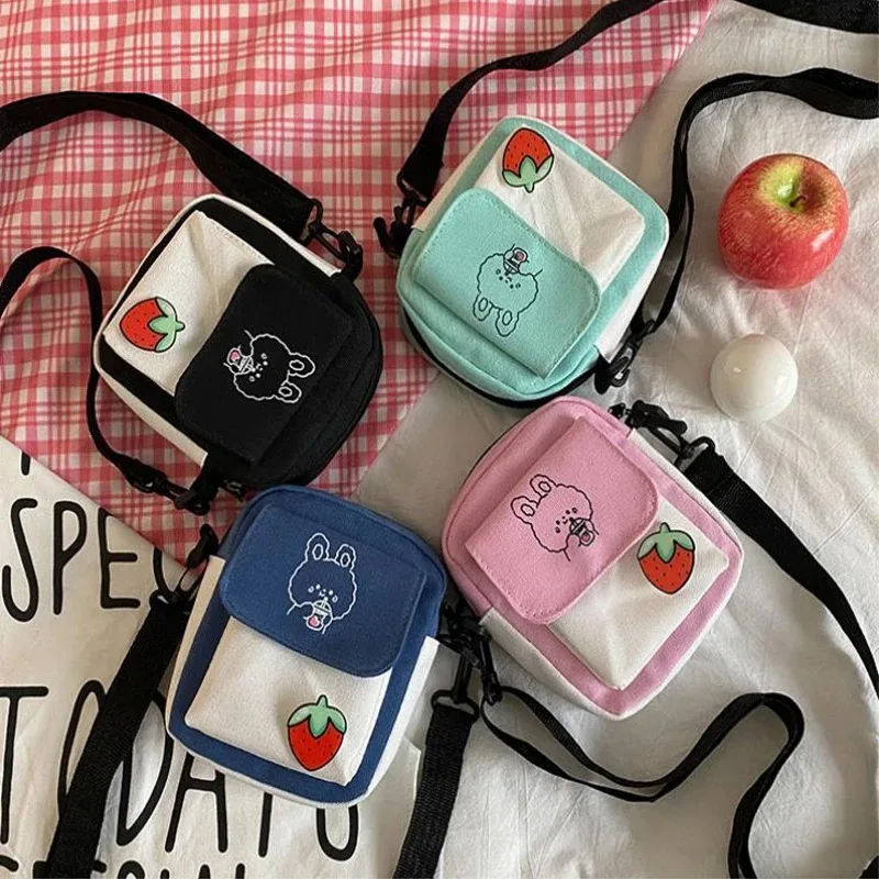 Canvas Women‘s Phone Bag Cartoon Printed Shoulder Messenger Bag Fashion Casual Handbag
Canvas Women‘s Phone Bag Cartoon Printed Shoulder Messenger Bag Fashion Casual Handbag