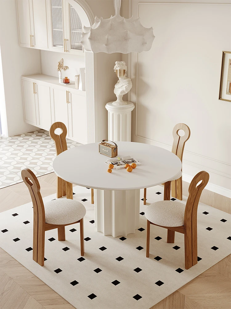 French Cream Style Stone Plate Dining Table Household Small Apartment Dining Tables and Chairs Set round Dining Table 
French Cream Style Stone Plate Dining Table Household Small Apartment Dining Tables and Chairs Set round Dining Table