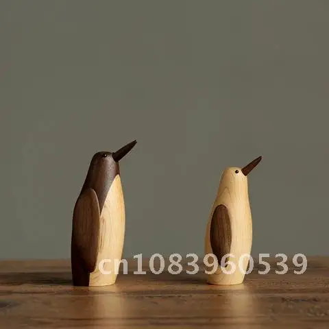 Wooden penguin ornaments small Denmark soft decoration American country housing model study desktop play equipment.
Wooden penguin ornaments small Denmark soft decoration American country housing model study desktop play equipment.