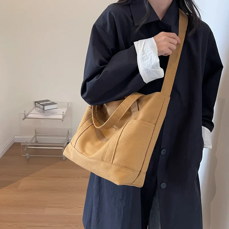 Large Capacity Canvas Tote Bags for Women Office Lady Work Commuting Carrying Bag College Style Student Outfit Book Shoulder Bag
Large Capacity Canvas Tote Bags for Women Office Lady Work Commuting Carrying Bag College Style Student Outfit Book Shoulder Bag