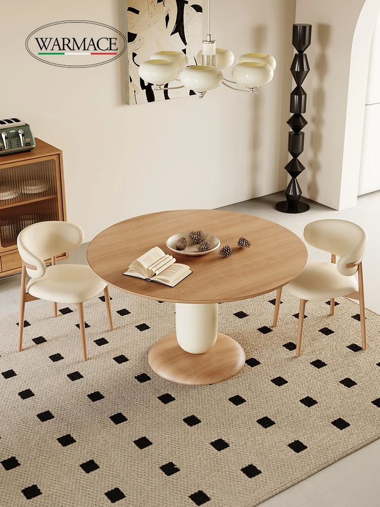All-solid wood dining table Nordic silent round table small household log color
All-solid wood dining table Nordic silent round table small household log color