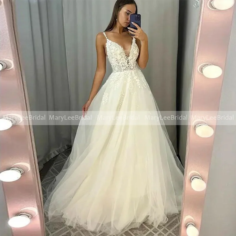 

Spaghetti Straps Boho Wedding Dress Floor Length Plunging V-neck Illusion Bodice Lace Appliques Lightweight Tulle Bridal Gowns