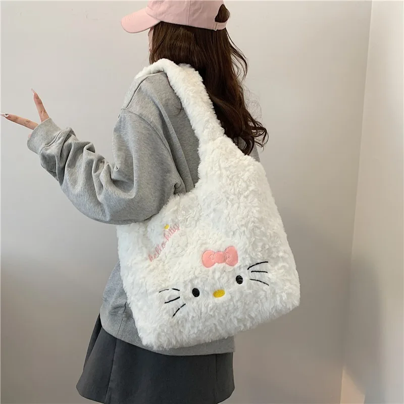 Sanrios Hellokittys милая и искусственная подвеска в форме сердца плюшевая вышитая сумка через плечо аниме милый девчачий для женщин Подарки
Sanrios Hellokittys милая и искусственная подвеска в форме сердца плюшевая вышитая сумка через плечо аниме милый девчачий для женщин Подарки