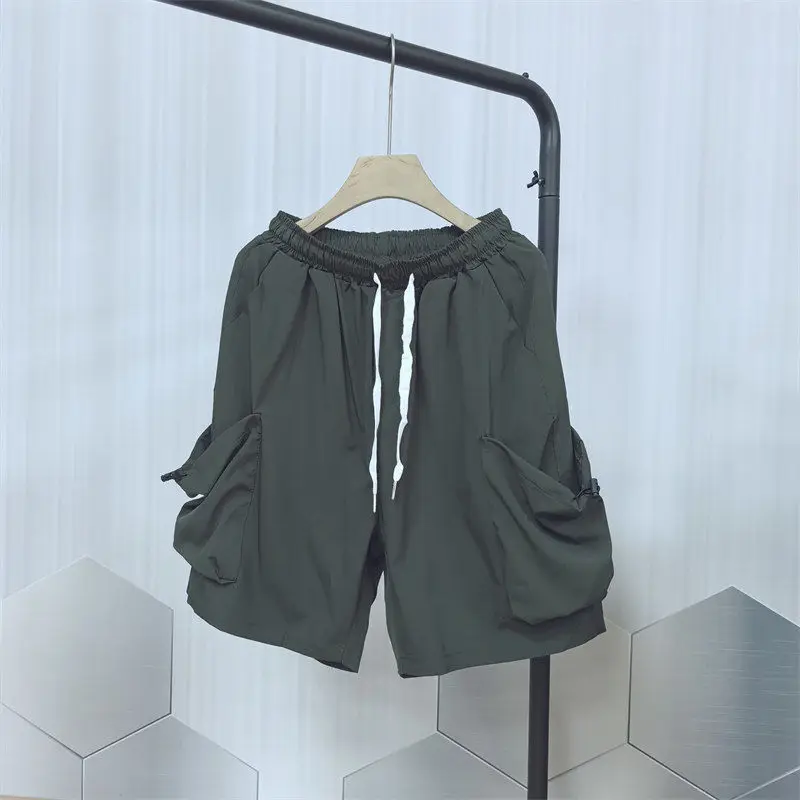 2024 Summer New Safari Style Solid Color Patchwork Elastic High Waist Drawstring Pockets Loose Casual Sports Men's Beach Shorts
2024 Summer New Safari Style Solid Color Patchwork Elastic High Waist Drawstring Pockets Loose Casual Sports Men's Beach Shorts
