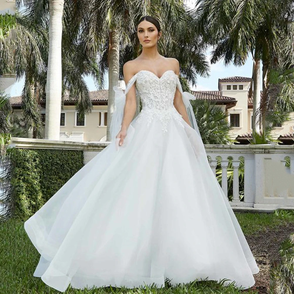 Elegant Princess Wedding Dress Sweetheart Neck and Backless Chapel Train High-end Appliques Bridal Church Formal Marry Gowns
Elegant Princess Wedding Dress Sweetheart Neck and Backless Chapel Train High-end Appliques Bridal Church Formal Marry Gowns
