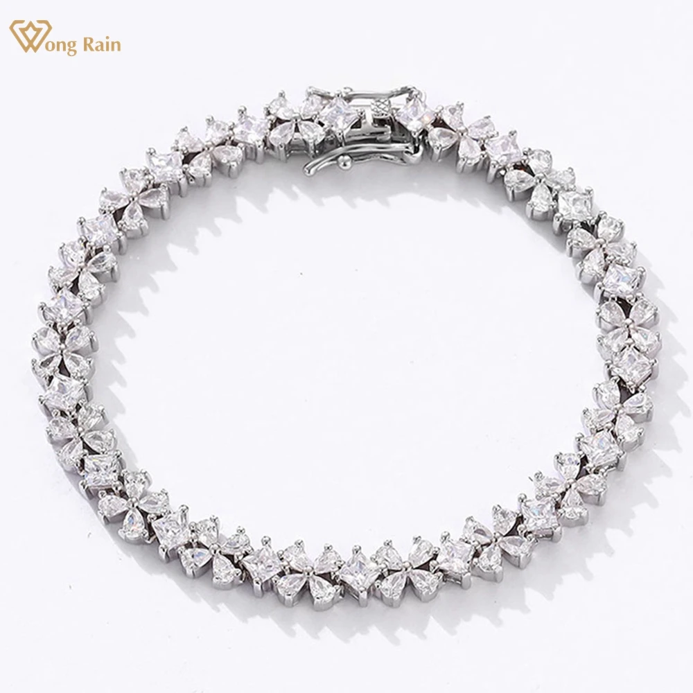 

Wong Rain 100% 925 Sterling Silver Sparkling Lab Sapphire Gemstone Flower Bracelets for Women Fine Jewelry Anniversary Gifts