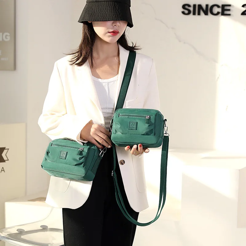 Nylon Crossbody Bag for Women Water-resistant Mobile Phone Pouch Small Handbag Nylon Messenger Bag Gift for Female
Nylon Crossbody Bag for Women Water-resistant Mobile Phone Pouch Small Handbag Nylon Messenger Bag Gift for Female