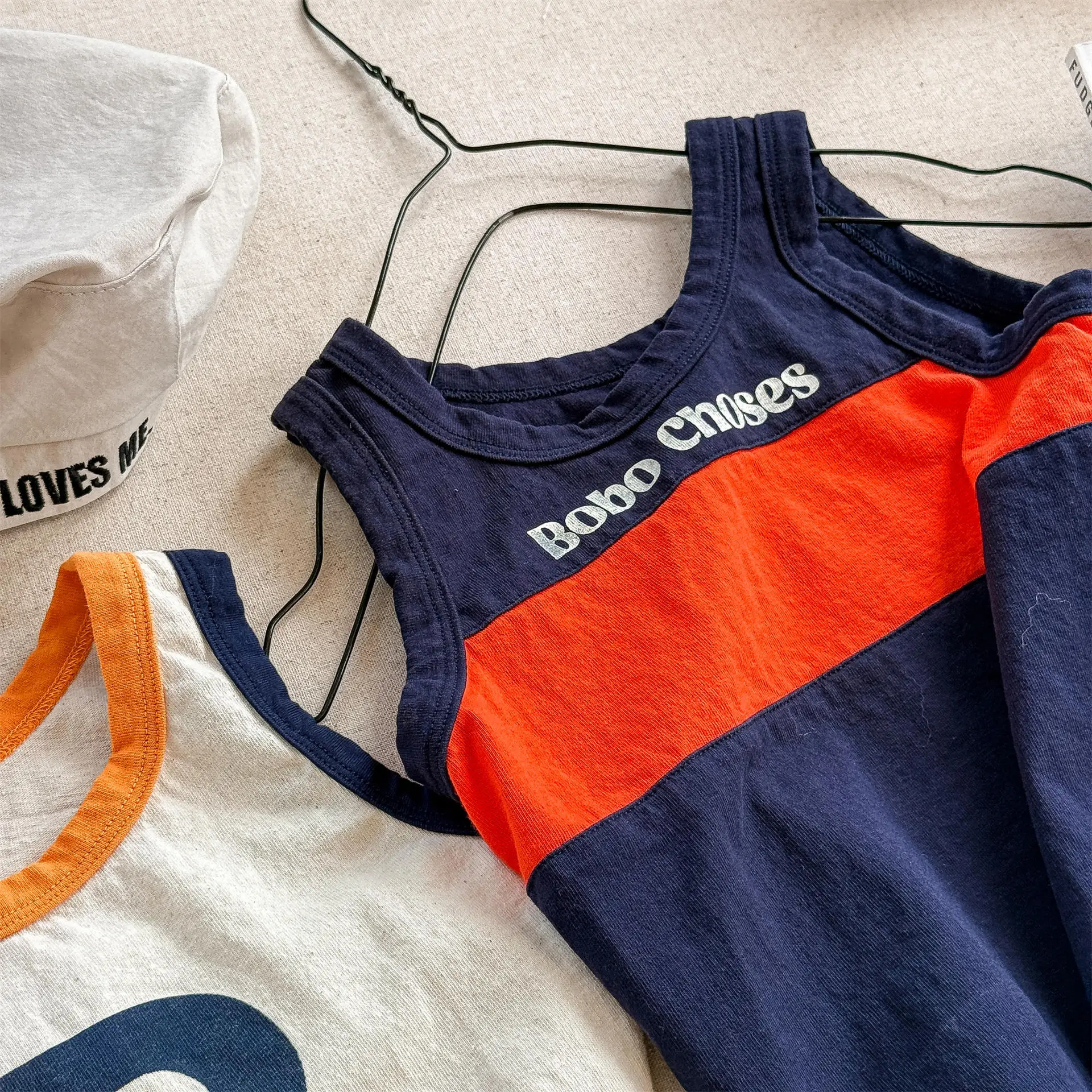 2025 Summer New Girls Sleeveless Vest Letter Print Boys T Shirts Cotton Children Casual Tops Loose Kids Tee Infant Clothes 24 S54807052f6c6414580c18dbb2c0e5351D
