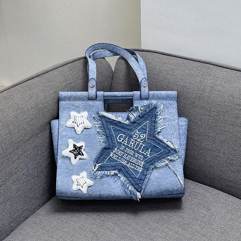 2023 Luxury New Design Retro Denim Tote Bag Plush Five Point Star Tassel Embroidered One Shoulder Crossbody Bag
2023 Luxury New Design Retro Denim Tote Bag Plush Five Point Star Tassel Embroidered One Shoulder Crossbody Bag