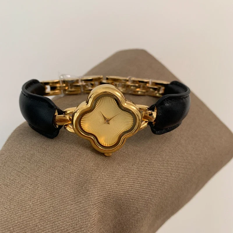 Montre plaquée or pour femme, bracelet en cuir, surface sculptée, style moyen âge, luxe et élégant, cadran Everver, nouveau, 2024 5