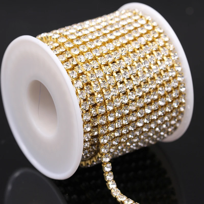 Shiny Rhinestone Trim 1 Row 4.4mm Ss18 clear glass Rhinestones Chain 10 Yards/lot Gold Metal compact base for Wedding Dress
Shiny Rhinestone Trim 1 Row 4.4mm Ss18 clear glass Rhinestones Chain 10 Yards/lot Gold Metal compact base for Wedding Dress