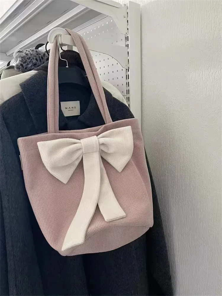 

Chic Pink Textured Tote Bag Large Bow Detail Soft Fabric Elegant Women's Handbag Spacious Stylish Feminine Accessory Daily Use