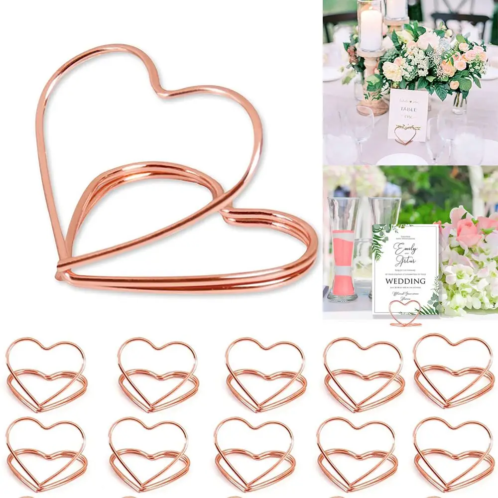 Wedding Supplies Heart Shape Paper Clamp Picture Cards Display Stand Photos Clips Place Card Clamps Stand Table Numbers Holder
Wedding Supplies Heart Shape Paper Clamp Picture Cards Display Stand Photos Clips Place Card Clamps Stand Table Numbers Holder
