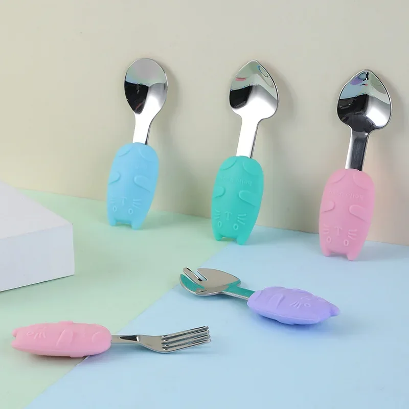 Мультяшная ложка для тела кошки с короткой ручкой из нержавеющей стали 304, силиконовая вилка, ложка для обучения еде ребенка, вилка, столовая посуда
Мультяшная ложка для тела кошки с короткой ручкой из нержавеющей стали 304, силиконовая вилка, ложка для обучения еде ребенка, вилка, столовая посуда