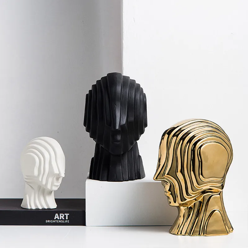 New Abstract figure sculpture Ceramic geometric head fringe Golden man alien decorative figurines home decoration accessories
New Abstract figure sculpture Ceramic geometric head fringe Golden man alien decorative figurines home decoration accessories