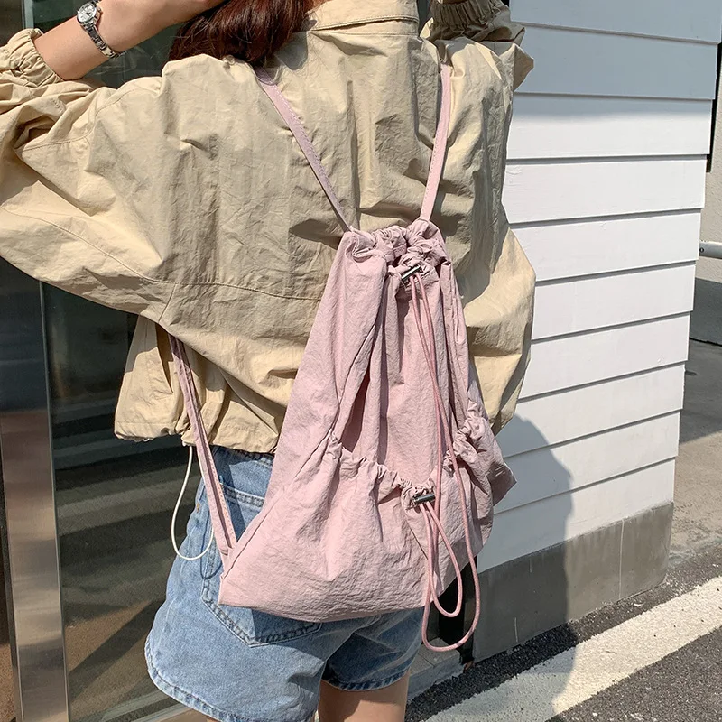 Casual Fashion Light Soft Nylon Ladies Shoulder Bag Y2k Summer Travel Mochilas Korean High-capacity Drawstring Women Backpacks
Casual Fashion Light Soft Nylon Ladies Shoulder Bag Y2k Summer Travel Mochilas Korean High-capacity Drawstring Women Backpacks