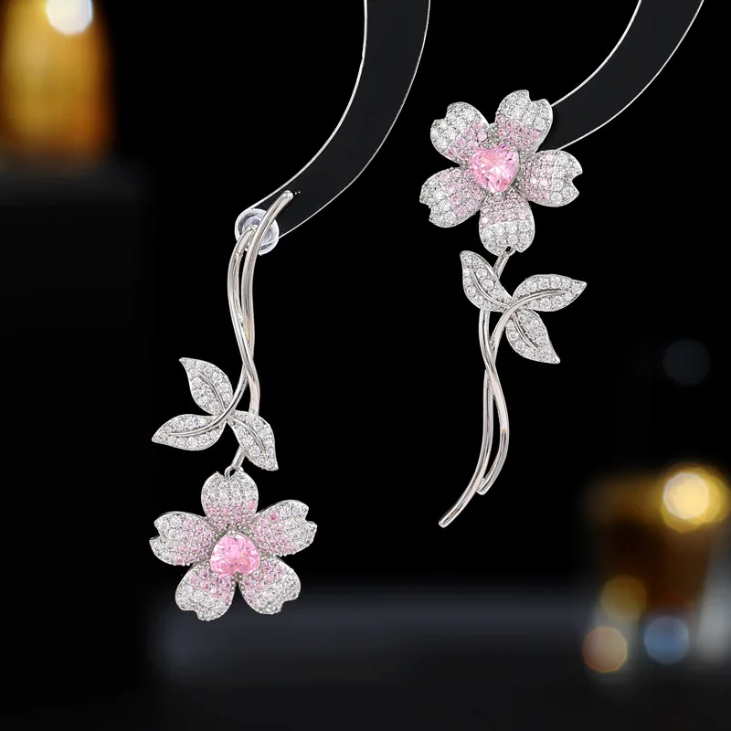 

Изысканные блестящие глянцевые асимметричные серьги-гвоздики в форме цветка 52x20 мм с кристаллом из циркония для женщин