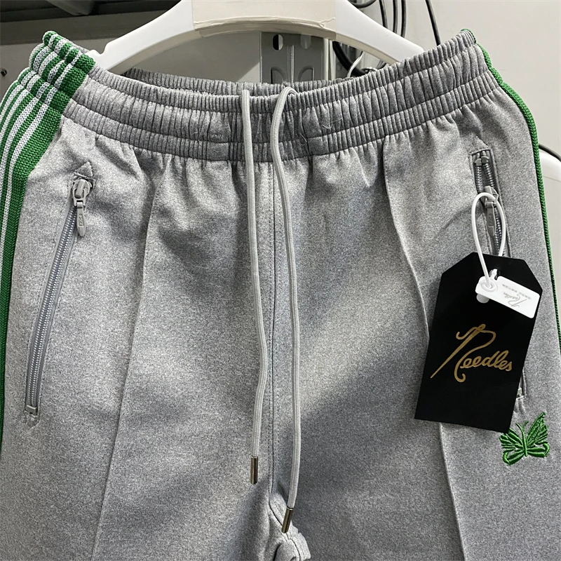 New Fasion Grey Needles Sweatpants Men Women Best Quality High Street Track Pants Green Butterfly AWGE Sporty Trousers
New Fasion Grey Needles Sweatpants Men Women Best Quality High Street Track Pants Green Butterfly AWGE Sporty Trousers