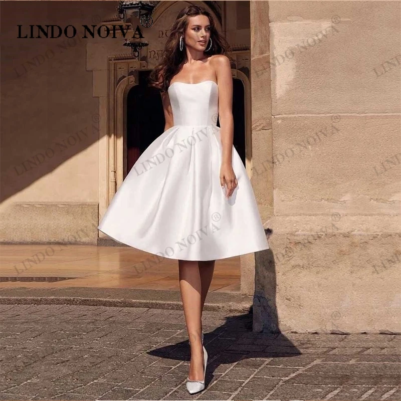 LINDO NOIVA Satin Sweetheart Neck A-Line Wedding Dresses Simple Short Backless Sleeveless Bridal Customized Gowns Robe De Mariée
LINDO NOIVA Satin Sweetheart Neck A-Line Wedding Dresses Simple Short Backless Sleeveless Bridal Customized Gowns Robe De Mariée