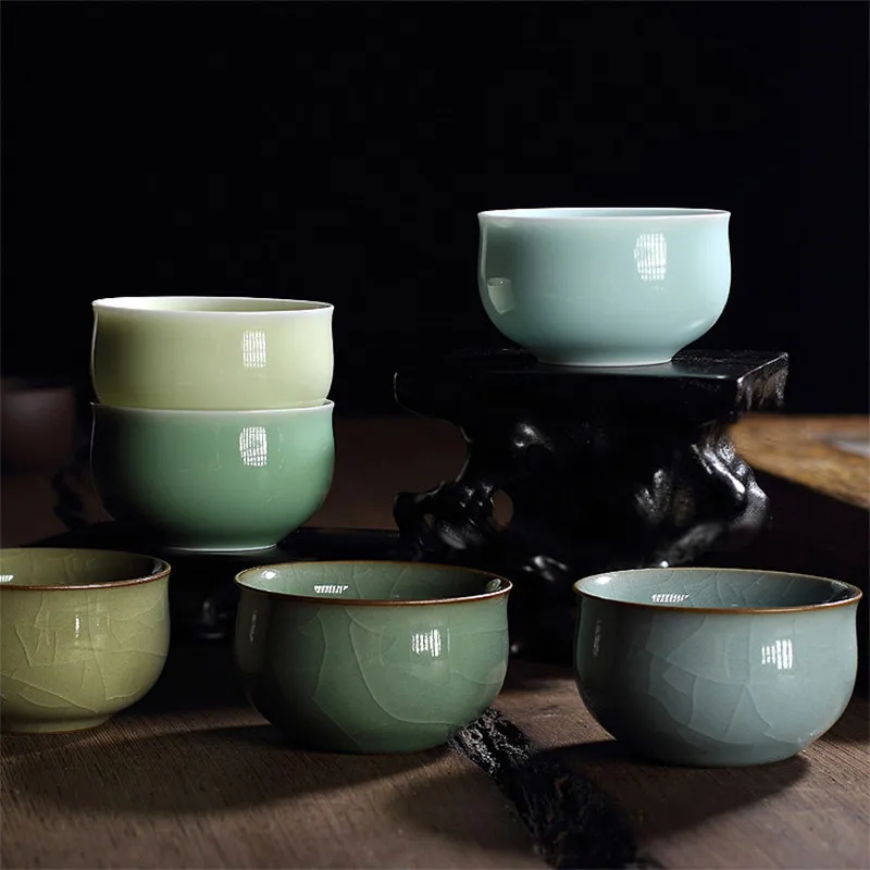 

Qing Yun Ge 4 PCS Chinese Kung Fu Teacup Flat Cup 1.8oz Ceramic Cups of Tea 55ml Porcelain Drinkware Glaze Pottery