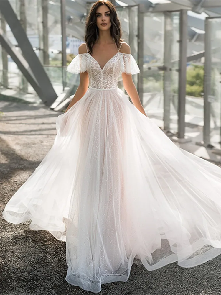 New Arrival V Neck Wedding Dress Beach A Line Sexy Spaghetti Straps Lace Bridal Gowns Tulle Court Train Vestidos De Fiesta 2023
New Arrival V Neck Wedding Dress Beach A Line Sexy Spaghetti Straps Lace Bridal Gowns Tulle Court Train Vestidos De Fiesta 2023