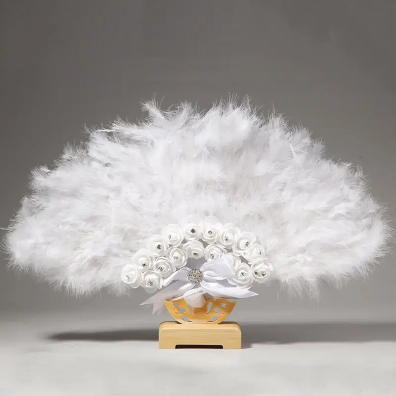 White Hand Fan Ladies Folding Feather Fans Graceful Bride Handheld Feather Fans Home Decor Dance Wedding Party Accessories
White Hand Fan Ladies Folding Feather Fans Graceful Bride Handheld Feather Fans Home Decor Dance Wedding Party Accessories
