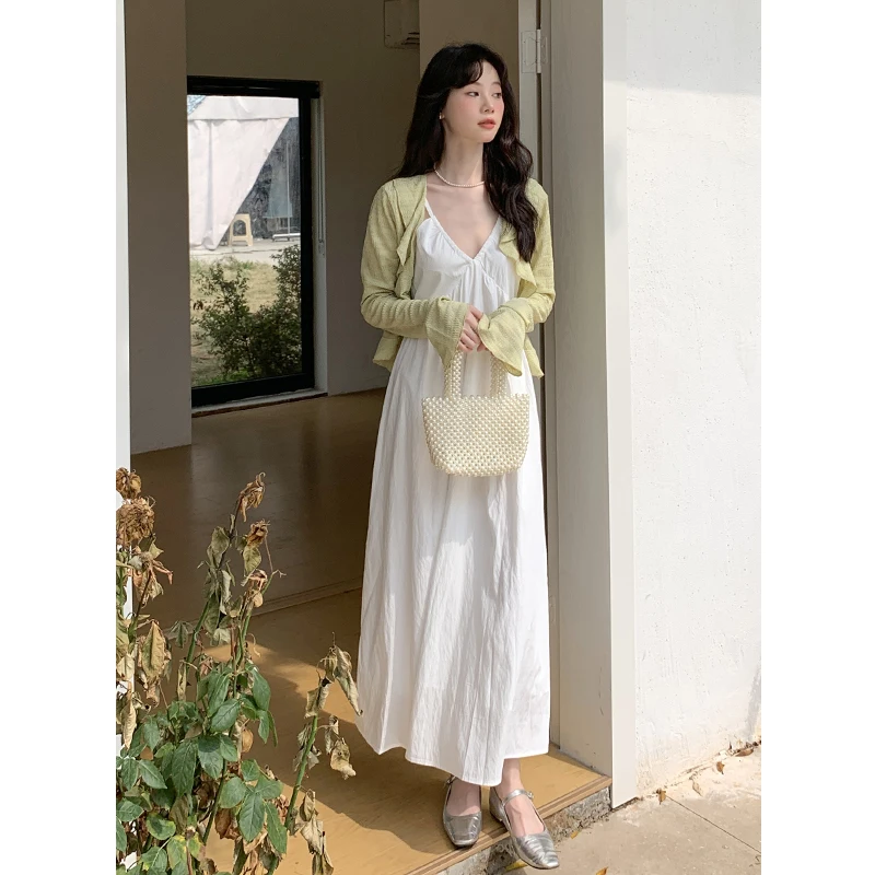 Женское пляжное платье с воланом, однотонные белые и черные платья без рукавов на бретелях-спагетти с высокой талией и V-образным вырезом, лето 2024 
Женское пляжное платье с воланом, однотонные белые и черные платья без рукавов на бретелях-спагетти с высокой талией и V-образным вырезом, лето 2024