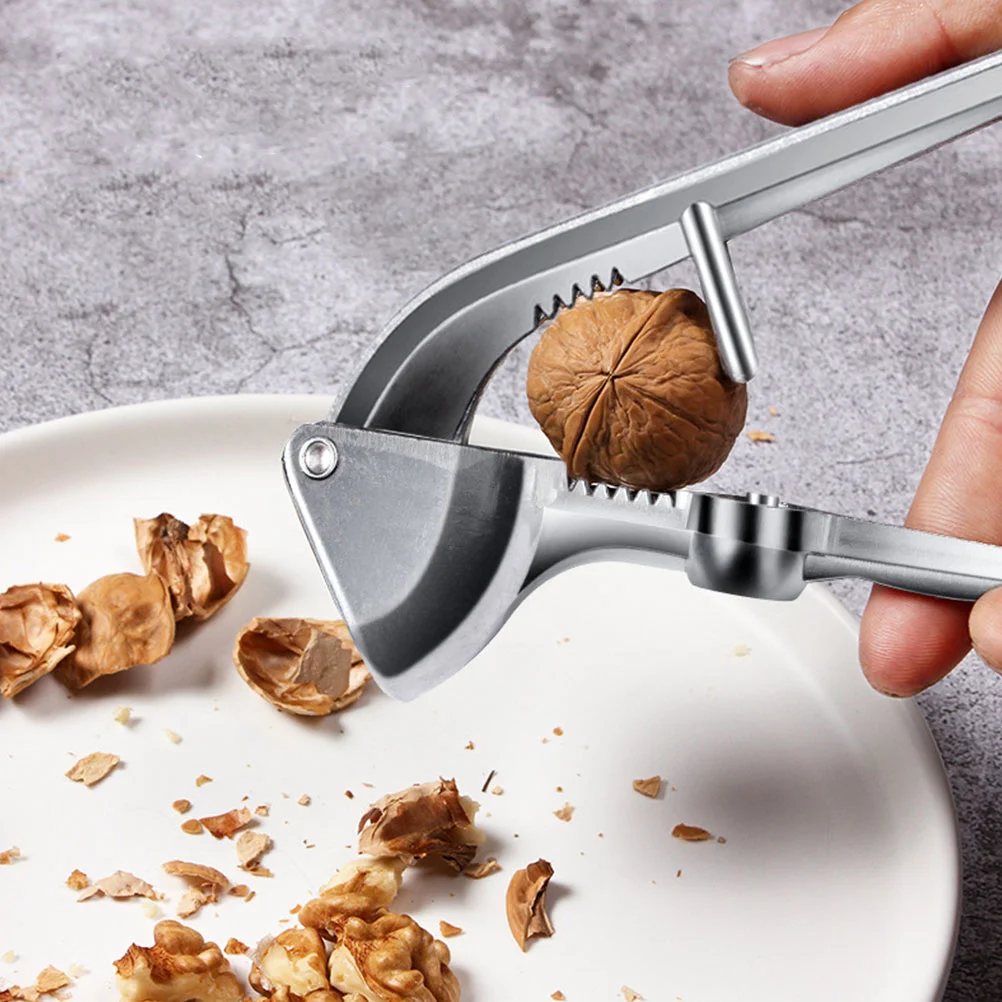 Stainless Steel Garlic Crusher Garlic Garlic Squeezer Kitchen Garlic Press Crusher and Mincer Garlic Smasher Garlic Keeper 
Stainless Steel Garlic Crusher Garlic Garlic Squeezer Kitchen Garlic Press Crusher and Mincer Garlic Smasher Garlic Keeper