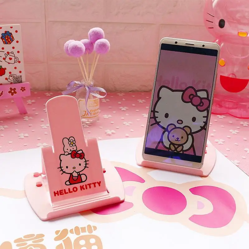 Hello Kitty Mobile Phone Holder Kawaii Sanrio Anime Cute Cartoon My Melody Kuromi Foldable Holder Lovely Toys for Kids
Hello Kitty Mobile Phone Holder Kawaii Sanrio Anime Cute Cartoon My Melody Kuromi Foldable Holder Lovely Toys for Kids