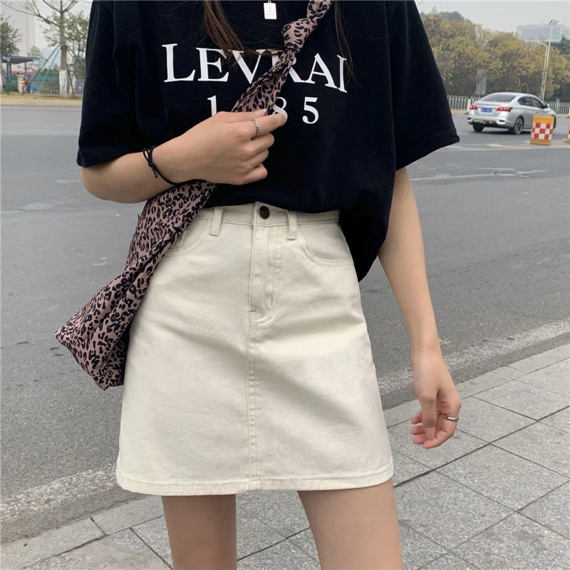 

Solid color denim skirt female students Korean version of high-waisted versatile niche package hip a-line half-body short skirt