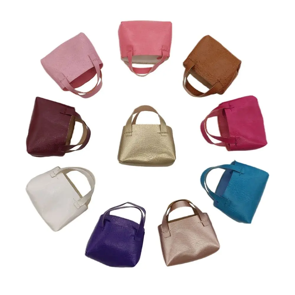 2pcs 10 Colors 1/6 Doll Accessories High Quality 4.8*2*5cm Fashion Lady Leather Bag PU Leather Purse Accessories 30cm Doll
2pcs 10 Colors 1/6 Doll Accessories High Quality 4.8*2*5cm Fashion Lady Leather Bag PU Leather Purse Accessories 30cm Doll