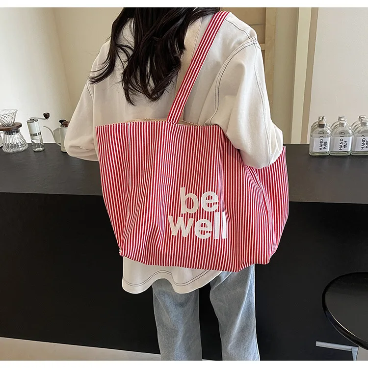 2025 New Fashion Striped Women's Shoulder Bag 18 S58e60a2d6daf4aacb29ffdb08c628e8eJ
