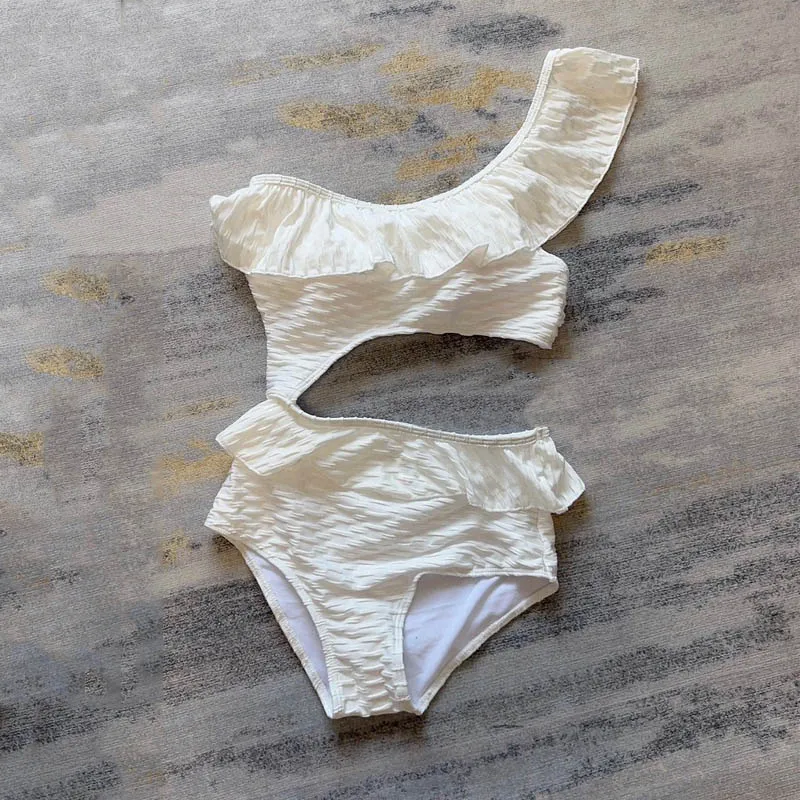 French fashion brand bikinis sets Korean peplum white sexy one-shoulder backless triangle one-piece Women's Swimwear size S-L
French fashion brand bikinis sets Korean peplum white sexy one-shoulder backless triangle one-piece Women's Swimwear size S-L