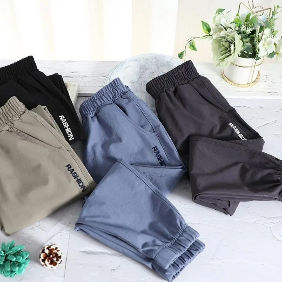 

2022 Summer Boys' Quick-drying Sports Pants Elastic Anti-mosquito Pants Middle-aged Children Trousers Loose Pants