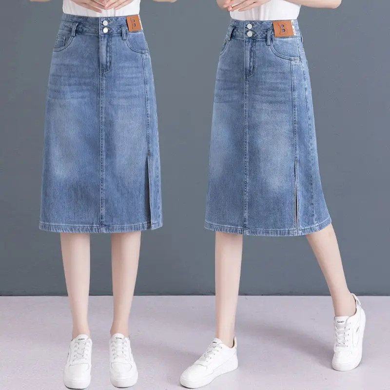 

Women's 2024 Summer New Minimalist Commute Solid Color High Waist Button Pockets A-line Thin Midi Split Hip Wrapped Denim Skirts