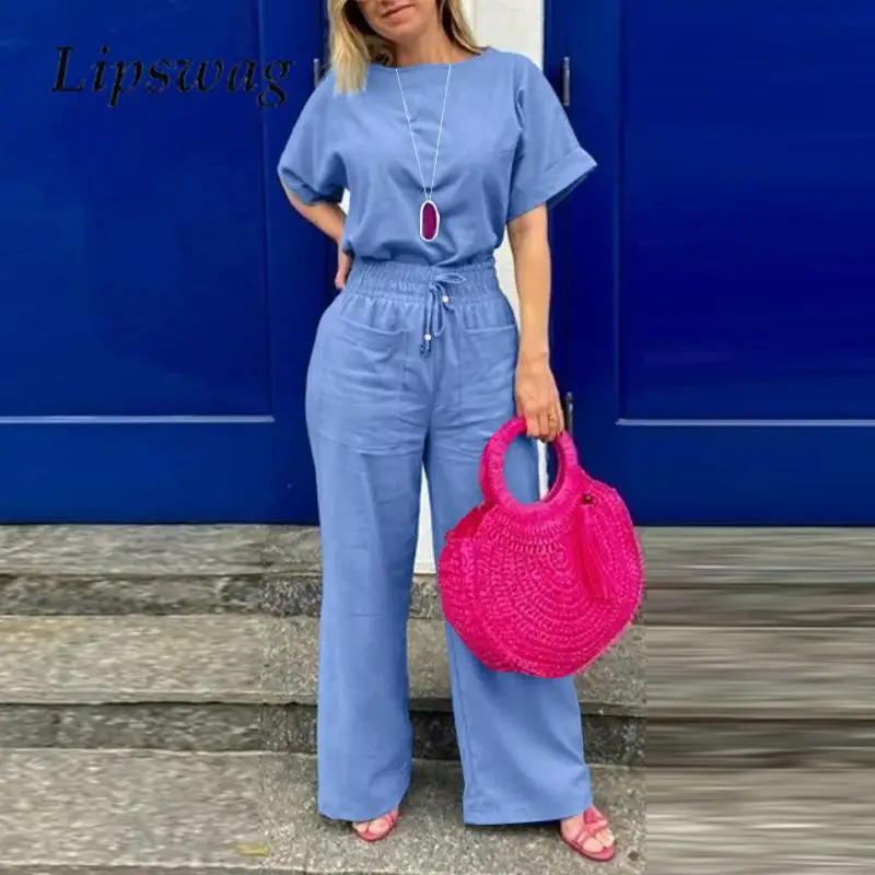 2023 Short Sleeve O Neck Top and Pants Set Summer Ladies Casual Two Piece Set Women Solid High Waist Elastic Pants Matching Set
2023 Short Sleeve O Neck Top and Pants Set Summer Ladies Casual Two Piece Set Women Solid High Waist Elastic Pants Matching Set