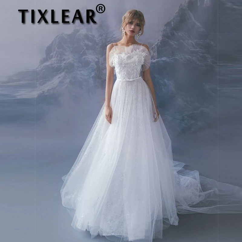TIXLEAR A-Line Tulle Wedding Dresses For Women Hand-made Flowers Open Back Covered Button Beach Bridal Gown Vestido De Noiva
TIXLEAR A-Line Tulle Wedding Dresses For Women Hand-made Flowers Open Back Covered Button Beach Bridal Gown Vestido De Noiva