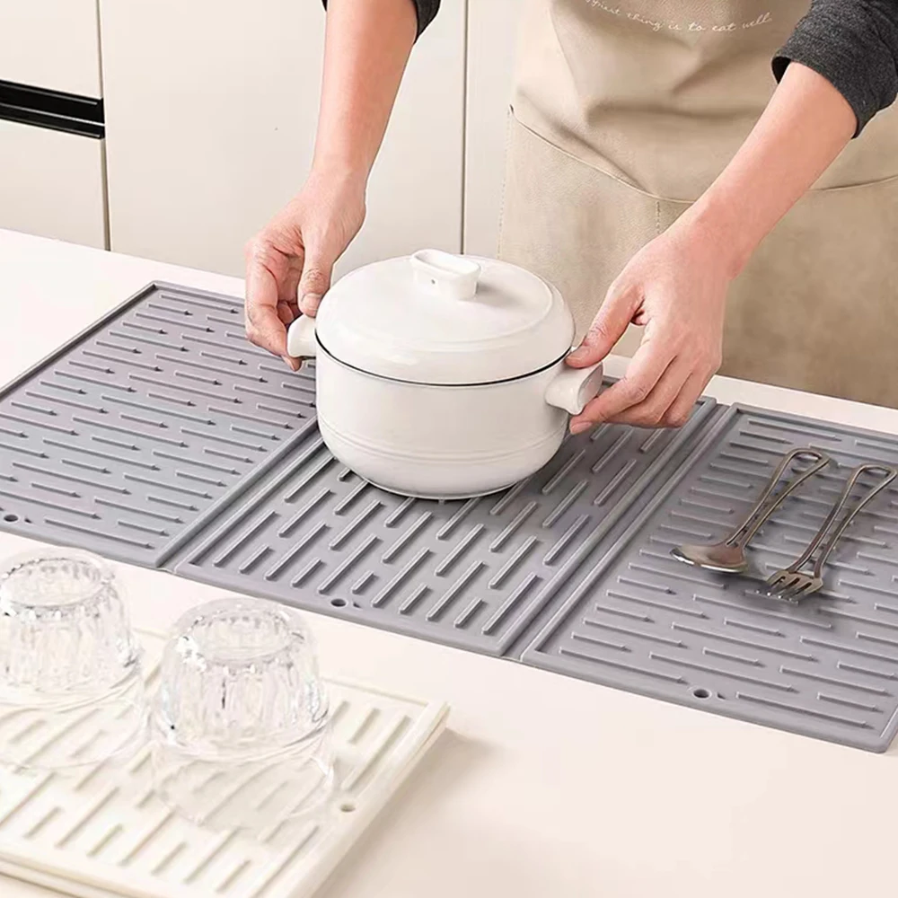 Dish Drying Pad Kitchen Table Top Three-Fold Large Bowl Drain Pad Heat-Resistant Pot Rack Anti-Slip Silicone Water Tank Pad
Dish Drying Pad Kitchen Table Top Three-Fold Large Bowl Drain Pad Heat-Resistant Pot Rack Anti-Slip Silicone Water Tank Pad