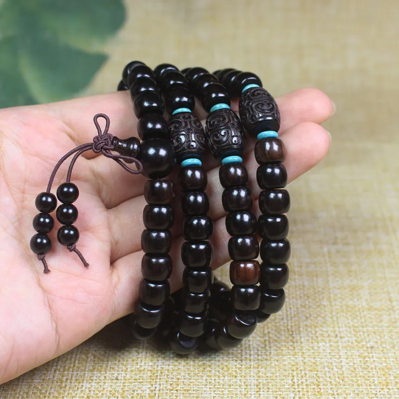Ebony apple beads 7 * 9 carved Ruyi bucket 108 beads Buddha beads beads bracelet
Ebony apple beads 7 * 9 carved Ruyi bucket 108 beads Buddha beads beads bracelet