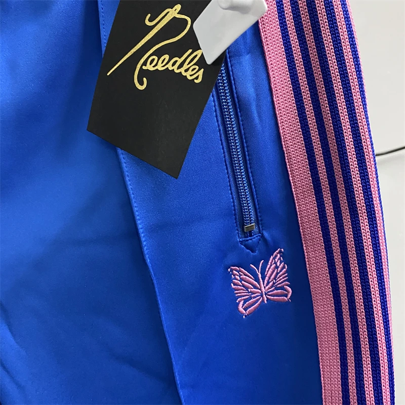 New Blue Needles Sweatpants Men Women Best Quality Pink Stripe Butterfly Track Pants Narrow AWGE Trousers
New Blue Needles Sweatpants Men Women Best Quality Pink Stripe Butterfly Track Pants Narrow AWGE Trousers