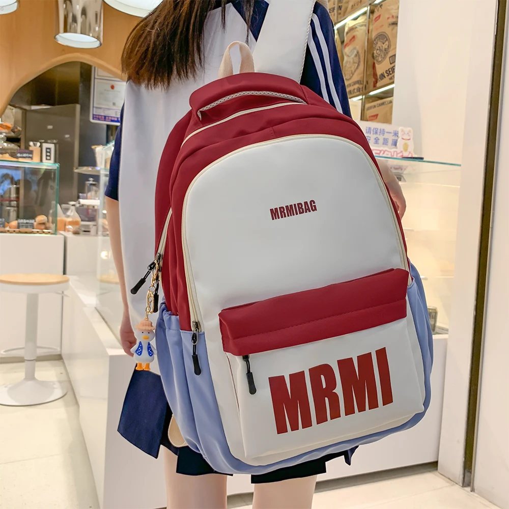 

High-Capacity Schoolbag Female Junior High School Students New Korean Campus Color Contrast Backpack Travel Laptop Backpack