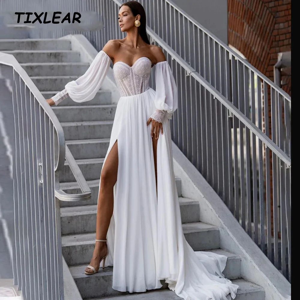 TIXLEAR BOHO A-Line Wedding Dress Sweetheart Lace Detachable Lantern Long Sleeves Sexy High Slit Chiffon Bridal Gown Robe Mariée
TIXLEAR BOHO A-Line Wedding Dress Sweetheart Lace Detachable Lantern Long Sleeves Sexy High Slit Chiffon Bridal Gown Robe Mariée
