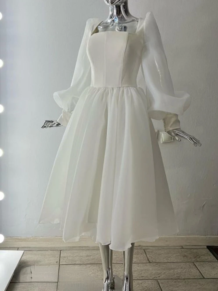 French Simple Square Collar Puff Full Sleeve Mid Length Ceremonial Dress Solid Luxury Shinny Chic Buttons Vestidos Elegant Gown
French Simple Square Collar Puff Full Sleeve Mid Length Ceremonial Dress Solid Luxury Shinny Chic Buttons Vestidos Elegant Gown