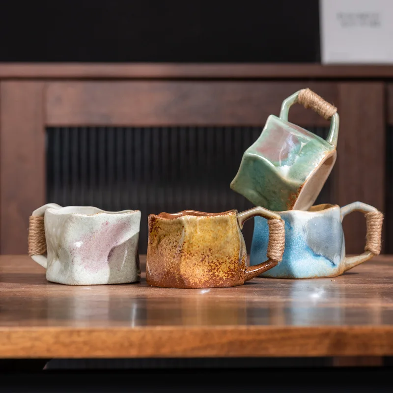 Retro Ceramic Coffee Cup Creative Hemp Rope Decorative Handle Handicraft Irregular Water Cup Afternoon Tea Mug Kitchen Drinkware
Retro Ceramic Coffee Cup Creative Hemp Rope Decorative Handle Handicraft Irregular Water Cup Afternoon Tea Mug Kitchen Drinkware