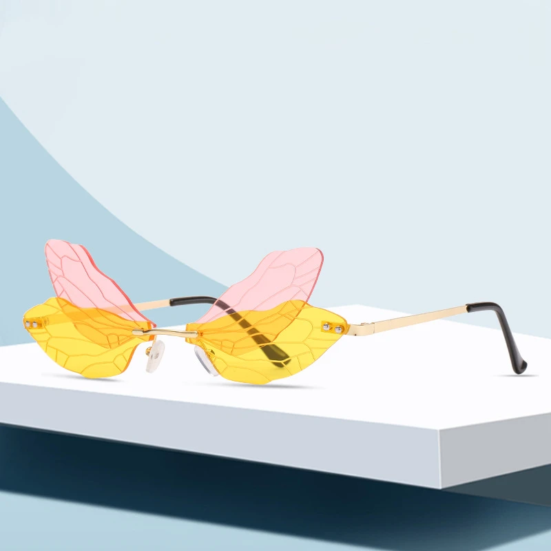 Vintage Dragonfly Wings Sunglasses Fashion Rimless Lens Luxury Eyewear Women/Men Sun Glasses UV400 Summer Style Eyewear
Vintage Dragonfly Wings Sunglasses Fashion Rimless Lens Luxury Eyewear Women/Men Sun Glasses UV400 Summer Style Eyewear