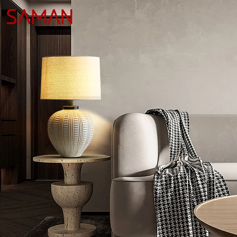 SAMAN Nordic Ceramics Table Lamp Modern Art Living Room Bedroom Study LED Originality Brass Desk Light
SAMAN Nordic Ceramics Table Lamp Modern Art Living Room Bedroom Study LED Originality Brass Desk Light