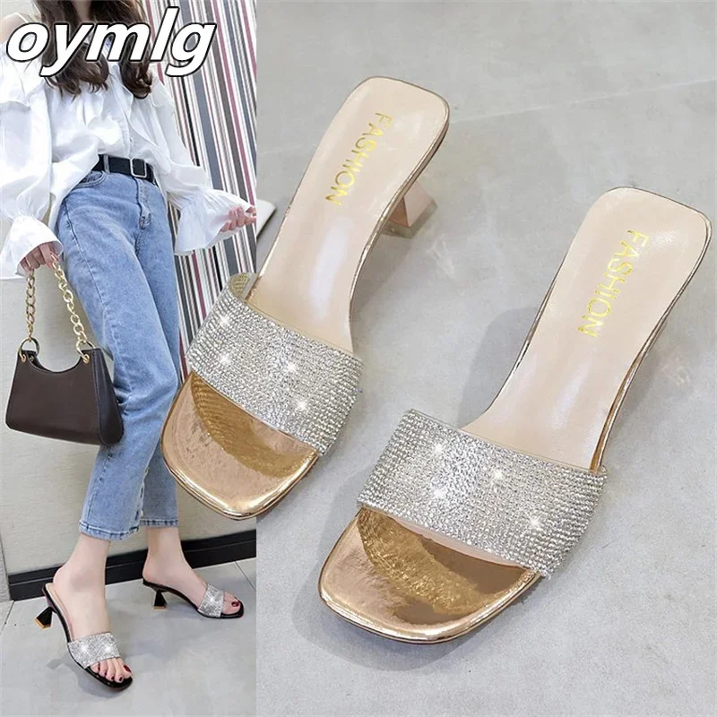 

Wearing slippers women's summer new 2022 sexy rhinestones one word thick with fairy wind square head large size sandals pumps