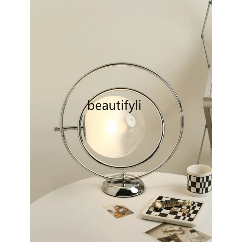 Post-Modern Creative Rotational Planet Bag Table Lamp Light Luxury Household Bedroom BedsideLamp Living RoomStudyDecorative Lamp
Post-Modern Creative Rotational Planet Bag Table Lamp Light Luxury Household Bedroom BedsideLamp Living RoomStudyDecorative Lamp