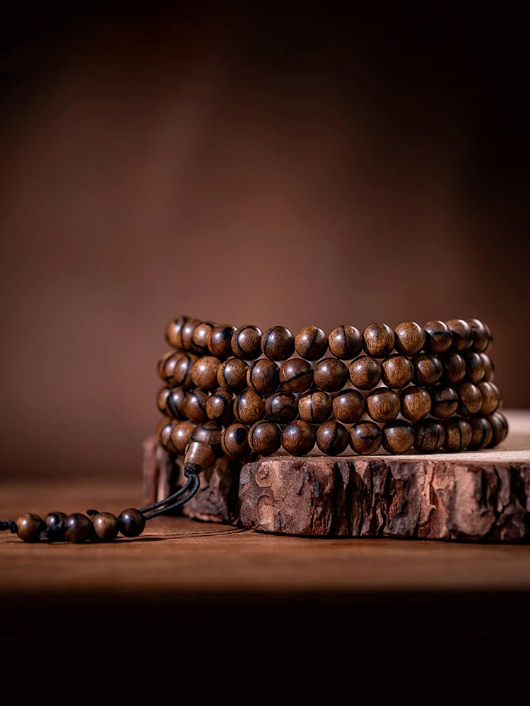 High Quality Real Natural Indonesian Tarakan Agarwood Beads Old Materials Bracelet Women Men
High Quality Real Natural Indonesian Tarakan Agarwood Beads Old Materials Bracelet Women Men
