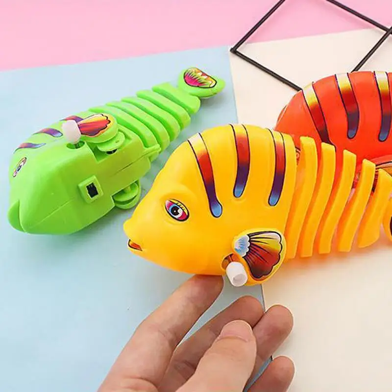 Plastic Windup Robot Swing Fish Interactive Clockwork Swinging Cartoon Fish Toys Classic Toy For Kids Birthday christmas Gifts
Plastic Windup Robot Swing Fish Interactive Clockwork Swinging Cartoon Fish Toys Classic Toy For Kids Birthday christmas Gifts